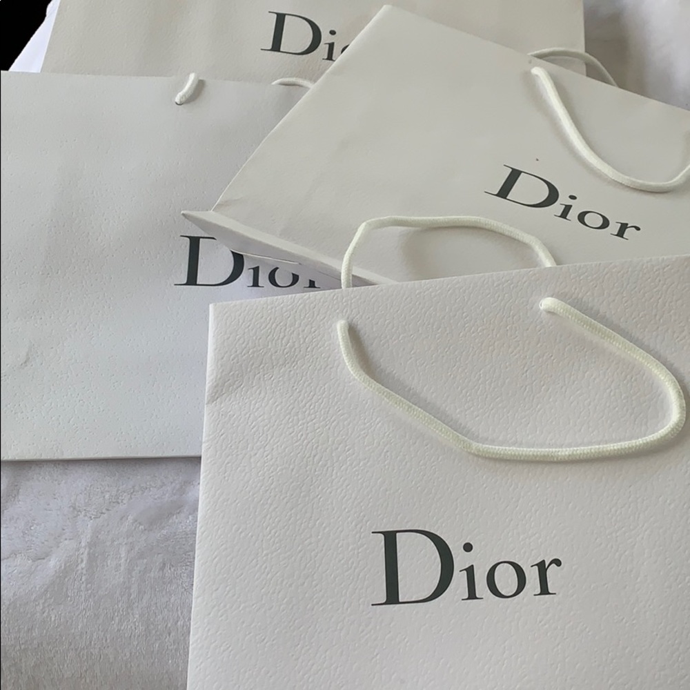 7 Dior shopping bags.